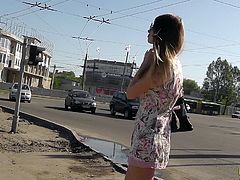 Skinny blonde gets filmed by dirty voyeur while in public scene