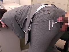Lewd Japanese office worker is having some fun with a guy indoors. She lets him cut a big hole in her pants through which the guy fingers and fucks the slut's cunt.