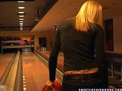Gorgeous and sexy blonde lesbian babes Wivien and her friend enjoy in teasing the boys with their hot bodies as they play with balls in the bowling room and have fun