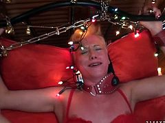 Lewd blonde milf Cassidy lets some guy tie her up to a bed. Then the man mouth-fucks Cassidy and destroys her shaved pussy.