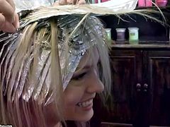 Attractive young blonde babes Blue Angel and Sandy with pretty faces and hot bodies in average clothing get filmed in close up while getting their hair fixed up in hairdresser studio