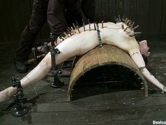 There's some fucked up stuff going on in this BDSM video where a brunette girl is experiencing some extreme bondage.