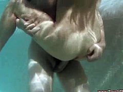 Cute little Asian babe is giving her man a very sexy massage complete with oil. She rubs her crotch on his foot, sucks his dong, and then she rides him. After, they get in the pool and they fuck underwater.