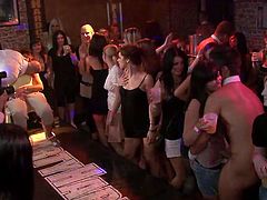 Slutty blond cutie cloisters with two aroused strippers in the corner in order to give them double blowjob, while another strip dancer fucks seductive bitch in missionary style on scene in sultry group sex video by Tainster.