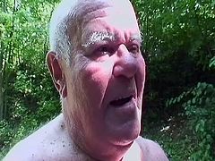 Busty grandma Daniela had too much beer and now she's acting like a slut. Her man grandpa Depa takes her to a walk in the woods where granny gets in touch with nature and his hard cock. Watch Daniela swallowing his saggy cock and enjoying herself, the old whore still knows how to give an awesome head!