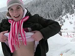 Getting cold after skiing, frisky brunette teen heads to the shower where two other lesbians join her before they start playing with a shower head.