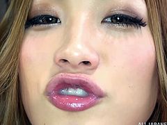 Sexy Japanese chick wearing a bikini is having fun with her man indoors. She licks and sucks his dick devotedly and moans hotly with delight.