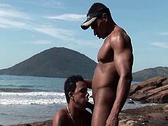 With the crystal blue sea behind them, this Latino couple is in the mood for a long blowjob and a deep bareback.