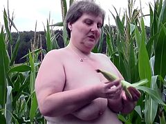 Redneck whore Tina is one of those bbw with a lot of lust. She's in the corn field and starts acting naughty. Her big, fat pussy needs some fucking and because there's nobody around Tina grabs a corn and fills her vagina. The fucking whore needs more then that, let's see if she will get some hard cock