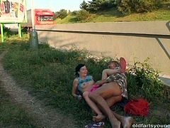 Spoiled brunette bushbitch gives a head to horny dude in the street during a daytime before he pounds her in sideways and doggy poses.