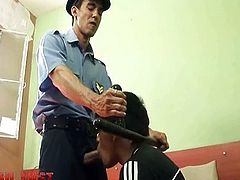 cop stretches hunky convict’s ass