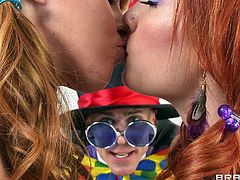 These two redhead girls are excited to see a joker. He brought a gift, but first they have to make some naughty moves, which will give the joker guy a boner. Soon enough he reveals his huge man meat right under his pants. Сuties grab his throbbing pole and suck it up and down all over.