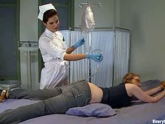 Nerdy blonde Ivy Mokhov comes to a hospital ward and lets hot nurse Bobbi Star stuff her tight asshole with an enema.