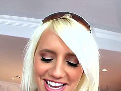 Super appetizing blonde Jacky Joy shows off her great enhanced boobs and gentle pussy lips