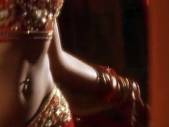 She is indescribably beautiful Indian girl. She has got svelte tempting body wrapped with red silk fabric. She takes off the robe demonstrating her beauty in all the glory.