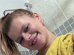 Brazen bitch with natural tits tickles her hairy cunt and pussy in shower