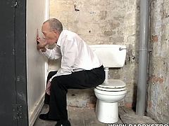 Take a look at this mature daddy sucking on a big shaft in the gloryhole. He is super cock hungry and just can't get enough of this hot rod!