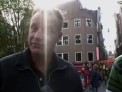 Two dudes from Finland go to the Red Light District. They go to the brothel and while one tapes everything on cam, spoiled slim ugly blondie in red lingerie rubs her wet pussy and provides one of the dudes with a handjob.