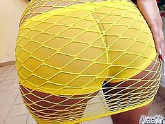 Her perfect ass peaks out through a sexy fishnet