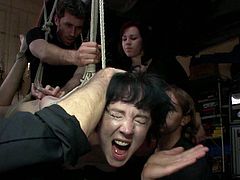Amazing bondage scene with brunette slut getting tied up with ropes and gagged while some fuckers fucker her hard. Check it out!