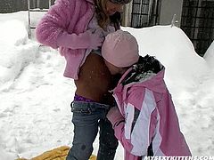 Frisky babes Amber and Tiffany fucks outdoor in the freaking cold weather