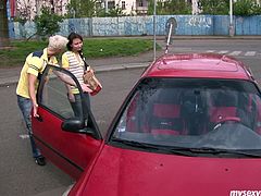 Brunette chick meets blond guy on a street. He offers her to have fun together so she agrees. They drive to the country side. When they are at the place, horny guy kneads Nataly's tits and suckles her nipples.