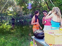 Handsome female football team coach is training girls on a field outdoor. They all later have a picnic outdoor. Girls drink much alcohol so guys plan to screw them in group sex action.