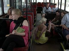 This bitch is tied up naked and fucked on a bus full of people that watch the nasty action as it goes down, check it out!