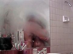 Really hot brunette vixen with big boobs is in the shower with her man and gets her pussy licked. She then nibbles on his cock before he shoves it up her wet pussy. When he's done, he jacks off on her gorgeous boobs.
