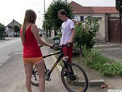 Sporty bodied chick walks along the road in the country side. She meets the guy that is riding bike. He offers her a ride taking her to the place where nobody will see them. Horny guy seduces Bella for sex caressing her tits.
