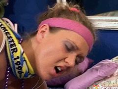 Busty slut wearing sporty outfit looks seductive as hell. She seduces young stud for hardcore sex. So she acts wild and outrageous. Horny dude punishes slutty woman banging her hard doggy style.