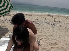 Curvy fresh faced Japanese cutie makes out with two horny dudes at the beach. She stands in doggy position getting her cunt poked hard from behind while giving blowjob to strain dick. Later she rides massive penis in reverse cowgirl style in sultry MMF sex video by Jav HD.
