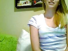 Blonde in a striped blouse sitting in front of webcam - 2