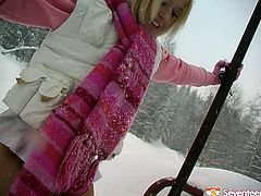 Stupid Russian blonde drills her snatch with dildo outdoor in snowy weather