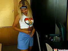Shabby looking blond teen stands in the hallway with one of the legs pulled up while finger fucking her sex greedy shaved vagina with pressure in steamy solo sex video by Seventeen Video.