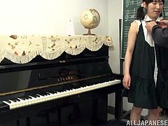 Lustful Japanese teen lifts her dress up right during the class and gets her vagina fingered. After that she gives him a blowjob and gets fucked from behind.