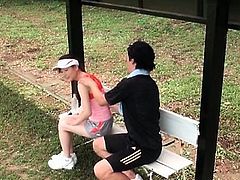 Asian teeny massaging her coach and giving him boner outdoor