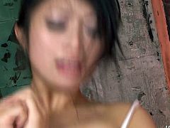 Nana Kunimi gets gangbanged with her hands tied up. She is made to suck cock and the penis is shoved deep inside her mouth. She rides one cock while she sucks another, then gets fuck from behind very hard.