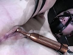 Slim brunette girl with a ball gag in her mouth gets tied up. Later on she gets her wet pussy toyed in close-up scenes.