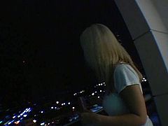 Aroused dude meets up with a seductive blond cutie in the hallway so he lures her to his hotel room. They head to the balcony with a great view on night city where she kneels down in front of him to mouth fuck his strain massive dick in pov sex scene by Pornstar.