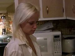 Kinky blonde chick with perky small tits is having coffee in the kitchen. Then she cooks for her BF wearing his shirt. Homemade video.