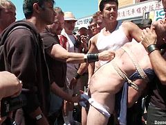 This dude loves to do sex in public. So, he gets tied up and whipped. After that he sucks big dicks and gets his ass destroyed.