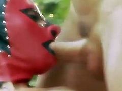 Naughty chick in a mask gives hot blowjob to a clown somewhere in a forest. Later on she gets double penetrated.