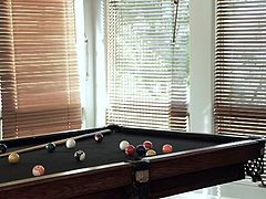 She lures him to play snooker but it's his balls she wants to play with. The sensual slut makes the guy undress and then takes off her panties, has a sit on the table and spreads her legs. Seeing her milky white thighs he goes insanely horny and eats her bald snatch. Her pussy needs a rough pounding!