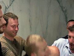 This dude gets in trouble. He gets undressed and tied up by group of gays in a restroom. So, he sucks their dicks and gets ass fucked. Seems like he really enjoys.