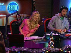 These three sexy girls are on the latest episode of the Playboy morning TV show and they answer questions and show off their boobs. Then they all get together and sing Christmas songs. They are sexy girls.