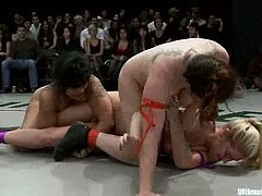 These girls fight for a while and then the losing girls get their pussies toyed and fingered right in a ring on the eyes of a audience.