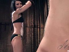 A kinky dude called Rico is having fun with beautiful slim brunette Simone Kross. Rico lets Simone beat and torture him and then enjoys the way she fucks his butt with a toy.