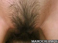 Mature Japanese babe Kazuyo Mori is sliding a vibrator in and out her super hairy pussy, while her man fucks her face. Tied of the plastic toy, she prefers her man's hard dick! Watch as