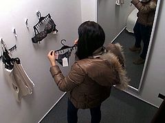 This brunette Czech teen has no idea there's a spy cam in the fitting room. She takes off her clothes and tries on new ones.